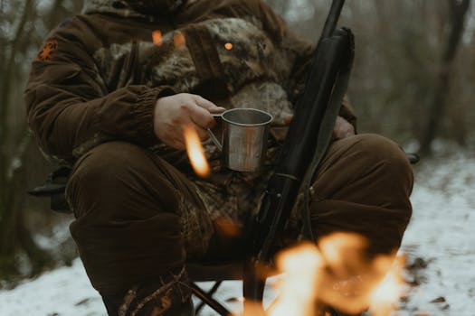 dog performing commands with a hunter