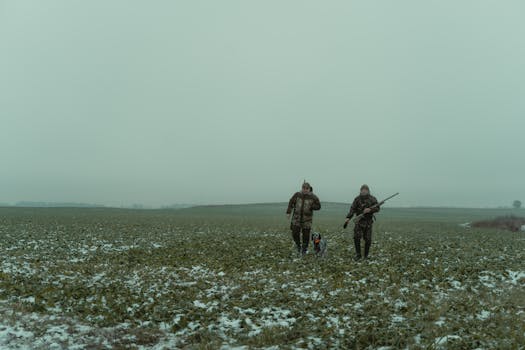 trainer working with a hunting dog
